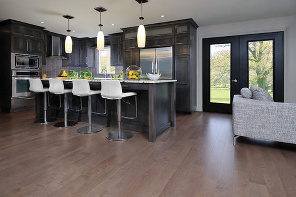 Restored kitchen hardwood floor after refinishing