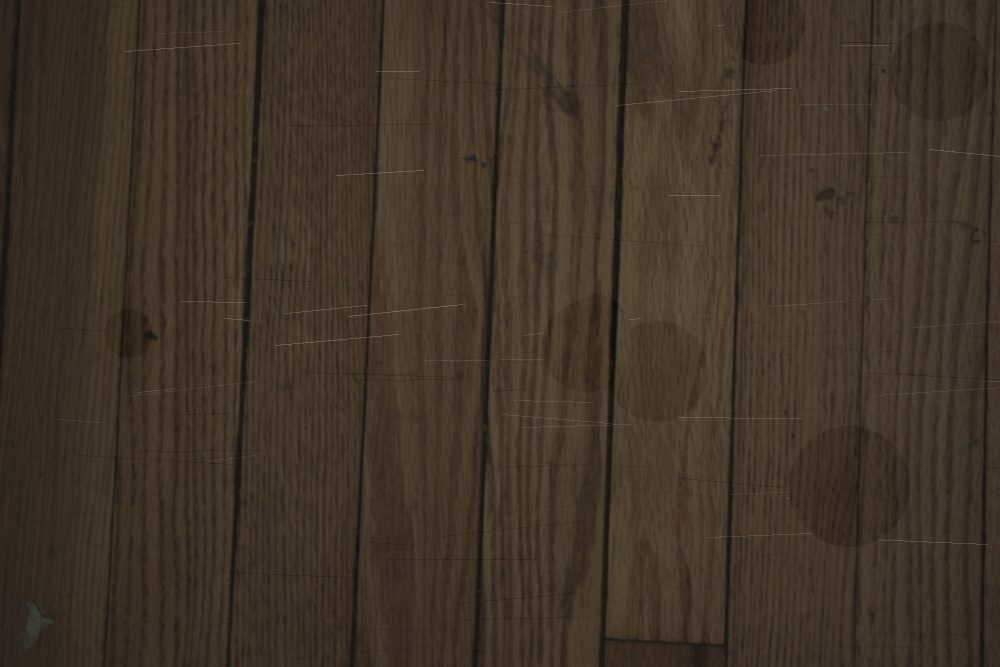 Worn, scratched hardwood floor before refinishing